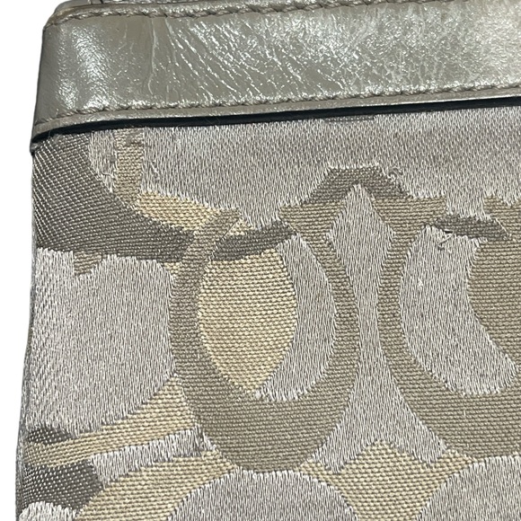 Grey cloth coach wristlet with leather accents and strap. Silver color. - Picture 9 of 11